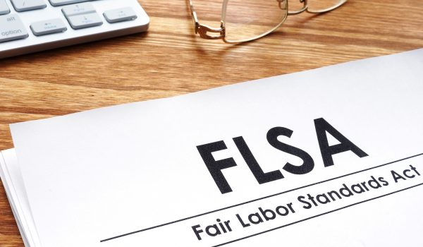 Fair Labor Standards Act FLSA On A Desk.