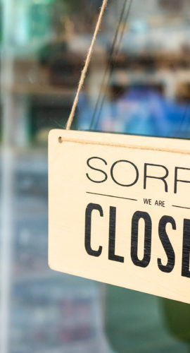 Sorry We Are Closed Sign Board Hanging On Door Of Cafe
