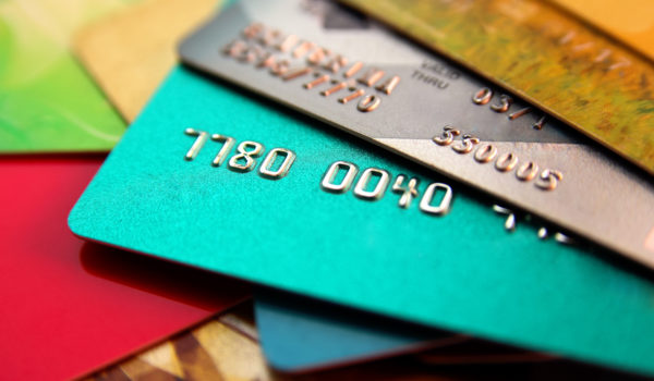 Stack Of Multicolored Credit Cards, Close Up View With Selective Focus